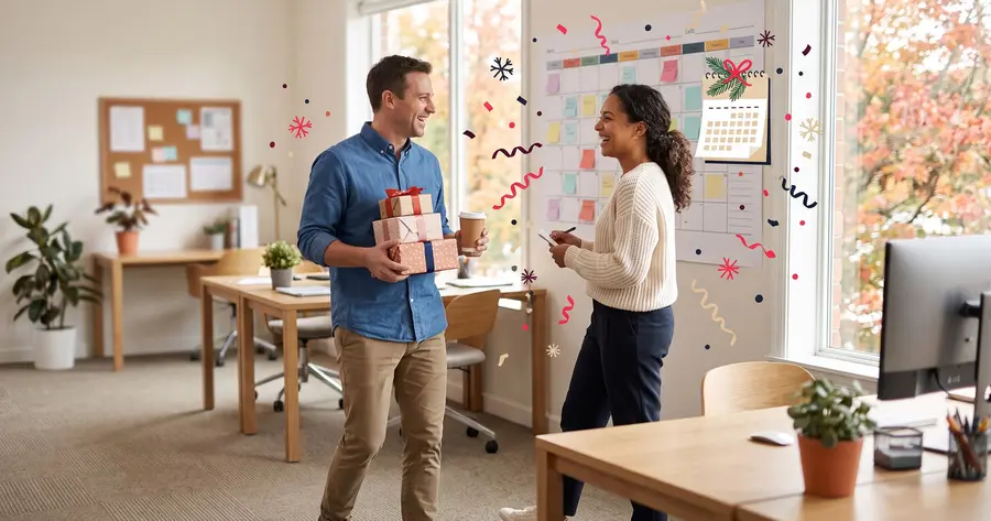 An HR coordinator checking a wall planner while a colleague arrives with wrapped gifts, both laughing